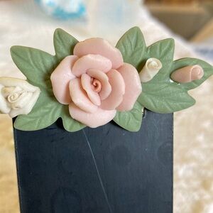 Avon’s EUC Vintage porcelain petals rose pin 
featuring multicolor flowers.